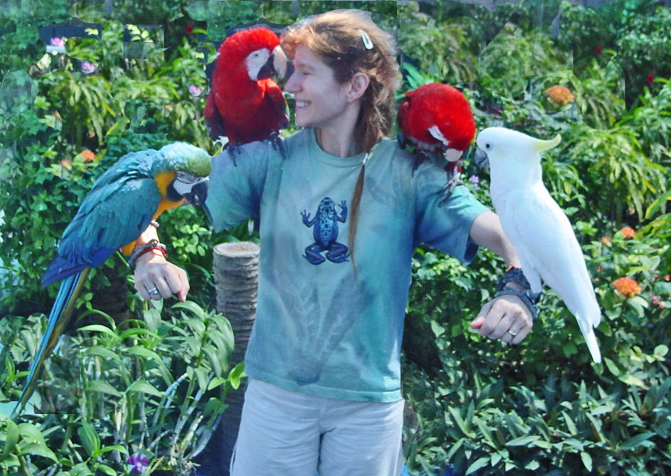 ALT =[“Dr. Jolie Bookspan: Dr. Bookspan with some of her bird friends.”] 