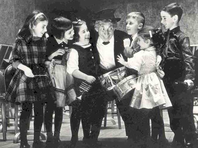 ALT =[“Dr. Jolie Bookspan met Harpo Marx when he conducted young soliosts of a concert of the Philadelphia Orchestra at the Academy of Music, Philadelphia: More on Dr. Bookspan's bio web page - http://drbookspan.com/bio] 